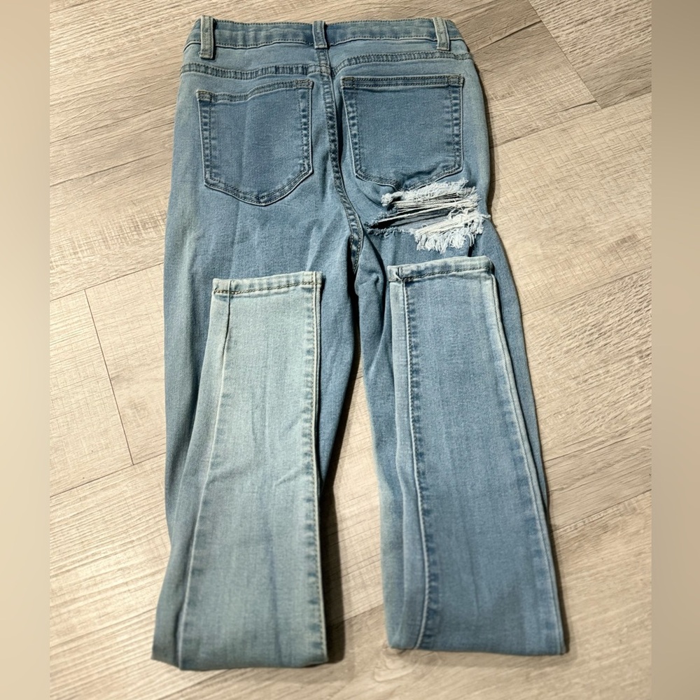 Pretty Little Thing Blue Jeans, with Rip in the back